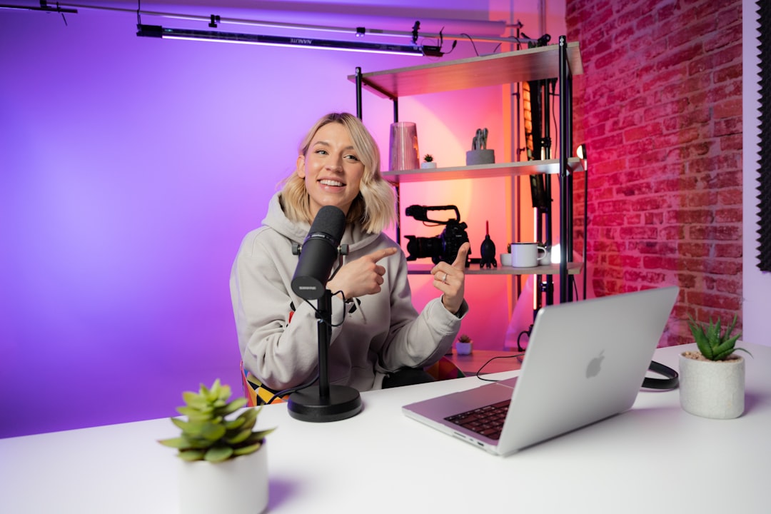 referral marketing news May 2026 - a woman sitting in front of a laptop computer